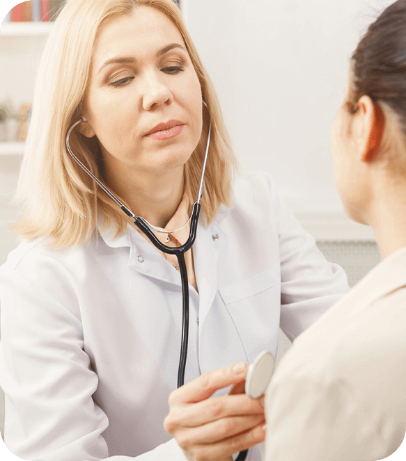 doctor examining patient